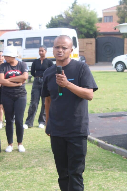 George Henry speaks to residents during the peaceful Rabie Ridge march on September 20. Photo: Comfort Makhanya