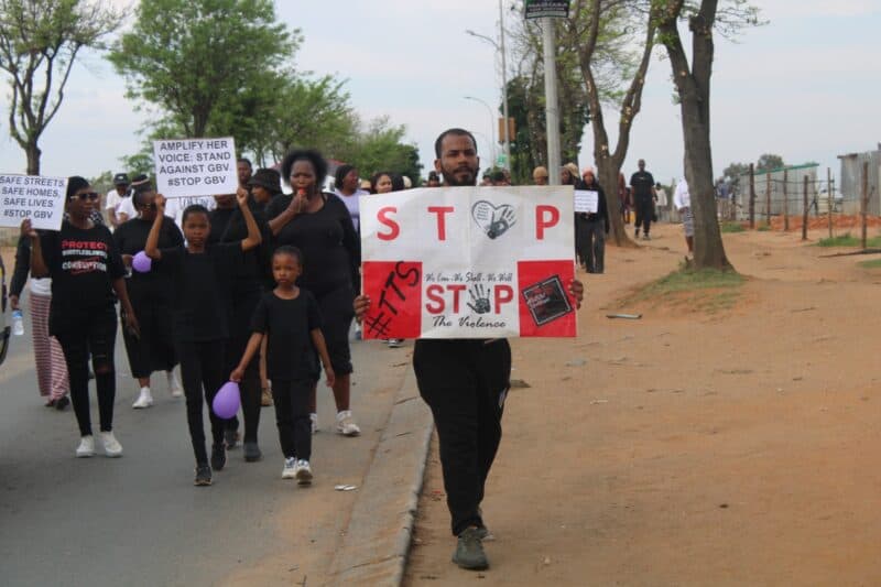 Residents gather with placards during the Rabie Ridge march, calling for an end to gender-based violence and femicide on September 20. Photo: Comfort Makhanya