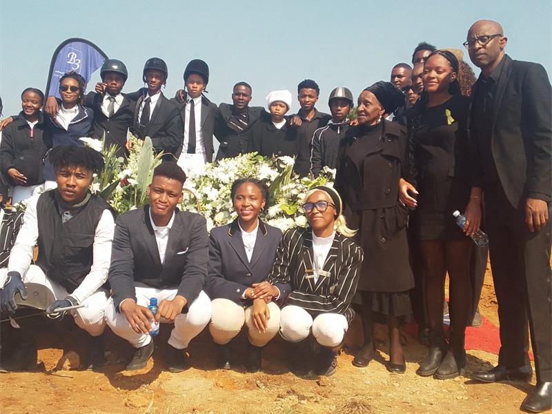 Family, friends and mourners gather at Waterfall Cemetery for the final farewell to legendary equestrian Enos Mafokate. Photo: Supplied