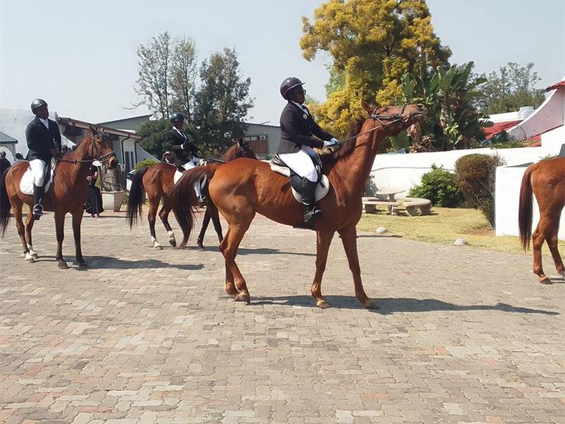 Young riders display a guard of honour in honour of Enos Mafokate's legacy. Photo: Supplied