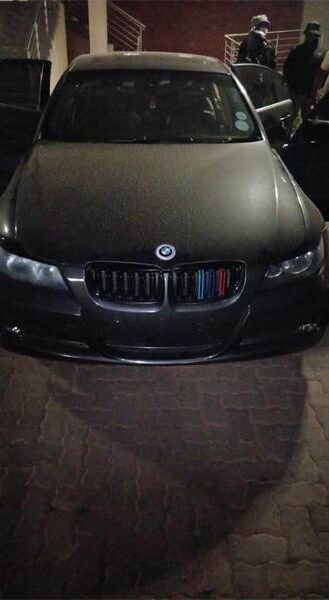 A black BMW 320i allegedly linked to other crimes was recovered during the multidisciplinary operation in Ivory Park. Photo: Community Safety department