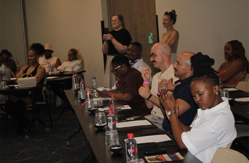 The room claps hands for the Chairperson Kaye Ally after giving a great speech at the Courtyard Hotel Waterfall on October 16. Photo: Itumeleng Molefe.