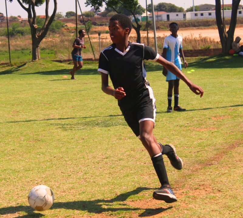 Somnyama Super United player Sive Mxabo and Mayibuye Development player Esihle Ludid compete for possession during their Midrand U15 League clash at Rabie Ridge Stadium on October 10. Photo: Comfort Makhanya