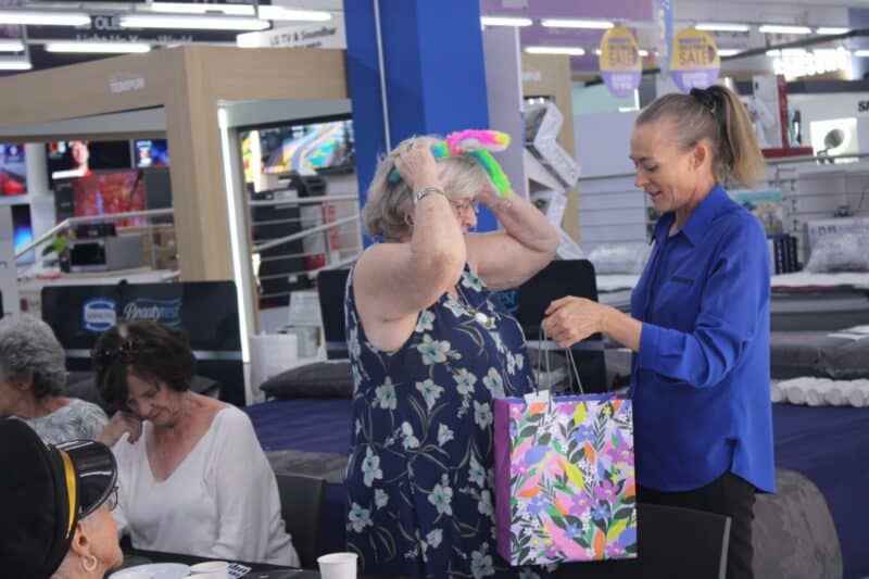 Hirsch’s PRO Michelle Paine gives Heather Smith her prizes after she won the game at Hirsch’s Waterfall on October 23. Photo: Itumeleng Molefe.