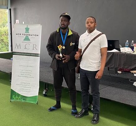 Midrand Rapid Open winner Chigozie Egeonu and Midrand Chess Club coach Kgosimang Molefe during the prize giving on September 26, 2026. Photo: Supplied