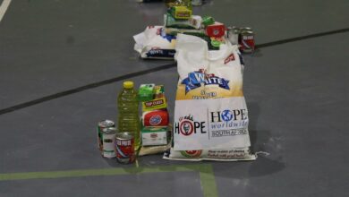 Hope Worldwide hand over food parcels