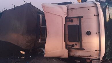 coal truck overturns