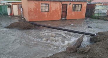 The house where the pipe has sprung a leak.