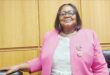 Image of Umzinyathi Mayor Thembisile Mchunu in a pink jacket.