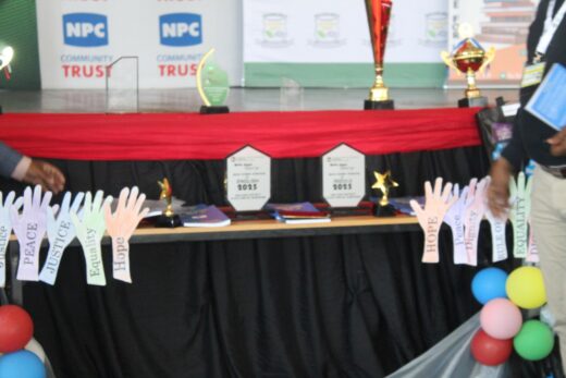 Trophies and displays take center stage at the ELITS Book Launch, symbolizing achievement, learning, and the spirit of excellence at Khaselihle Full Service School.