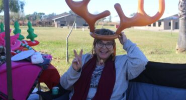 A picture of Jeannette Olivier Jouth at her stall selling funky, bespoke items at the Grace Park Market Day
