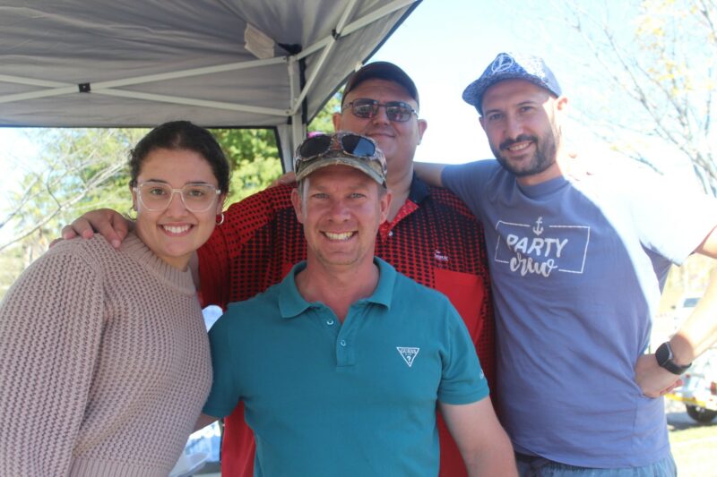 Megan, Steven, Eugene and Barend standing at their stall at the Grace Park Market Day.