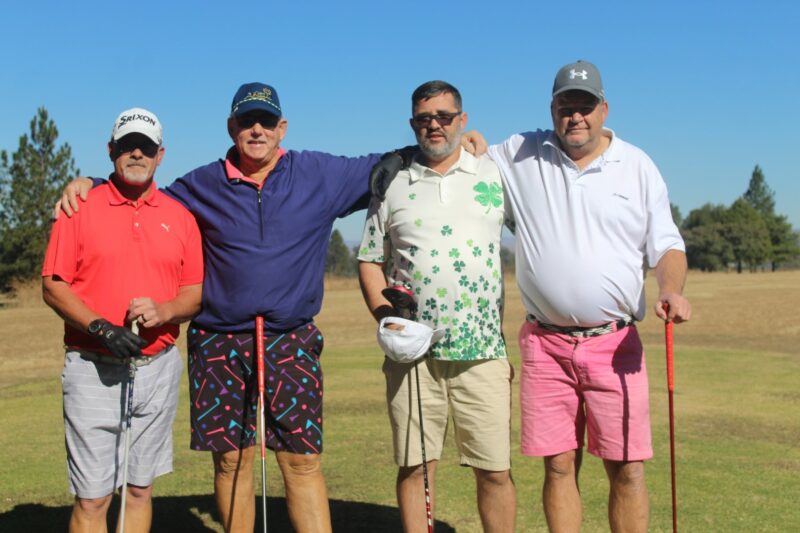A picture of Robbie Nienaber, Dries Els, Cor Meyer and Manie Mostert. at the Ferrum Golf Day.