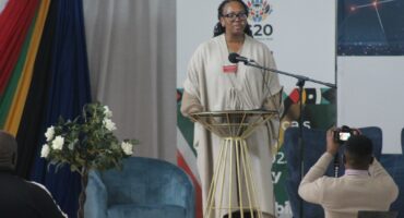 A picture of Mokgadi Rabothata introducing the panel discussions at the G20 Education Working Group event hosted by Majuba TVET College.