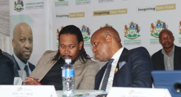 A picture of KZN Premier Thami Ntuli and Newcastle Mayor Xolani Dube conversing during the community dialogue organised by the Amajuba District Municipality.