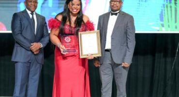 A picture of Sgt Mdluli excepting her award at the 2024/2025 KZN SAPS Provincial Excellence Awards.