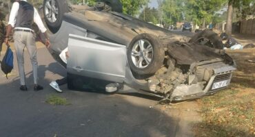 Motorist avoids injury as man runs into road
