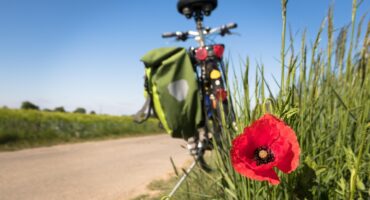 Cyclists race through Malawi to help fund community waterwells.