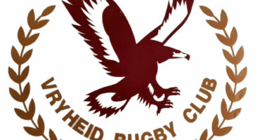 Vryheid Rugby Club logo, a maroon eagle with its wingspan open and claws out with the name of the club in gold underneath on a white background.