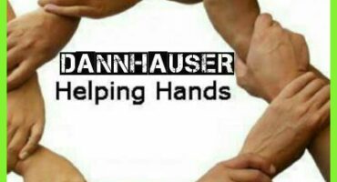 Image depicting hands joined together in a circle.