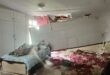 Collapsed ceiling and water damage inside a flooded care home room.