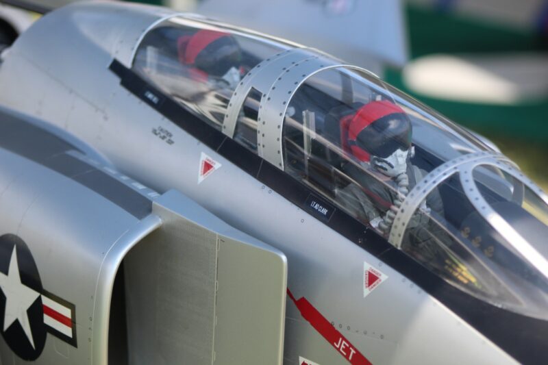 A grey and red model aircraft.