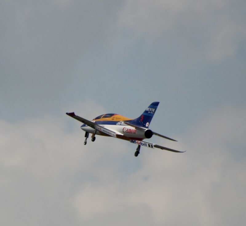 A blue, white and yellow model aircraft.