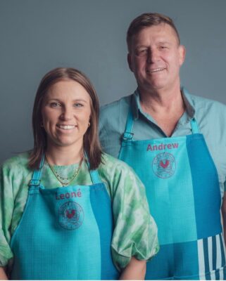 Image of woman with her father dressed in blue Kokkedoor branded aprons.