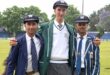 Three young boys are pictured in their school uniforms after being selected fro the KZN Inland Cricket team. All three are wearing their KZN Inland Cricket caps.
