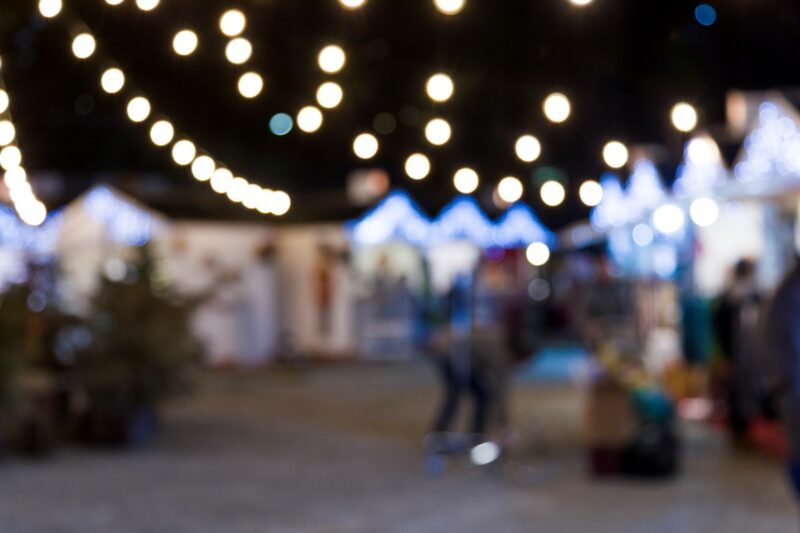 A picture of blurred-city-lights during a night market.