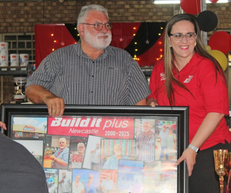 a father and daughter are pictured holding a framed collage of photos taken over a span of 25 years.
