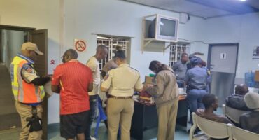 Several RTI and SAPS officers are processing drunk drivers in an SAPS office in Newcastle.