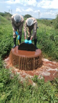 Image of workers clearing sewer system in Glencoe.
