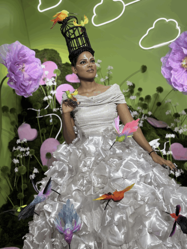 Miss South Africa winner, Mia Le Roux dressed in a stylish garden themed dress during the World Hairstyling Championships.