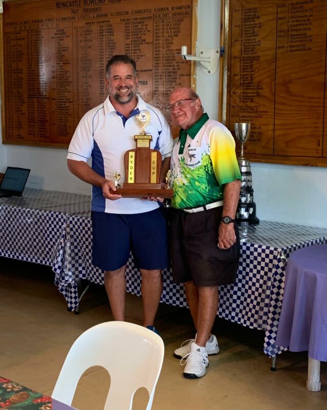 Newcastle President Bennie van Vuuren receiving the Ryder Cup from zone chairman Dougie Slabbert photographed with a trophy at the Newcastle Club.
