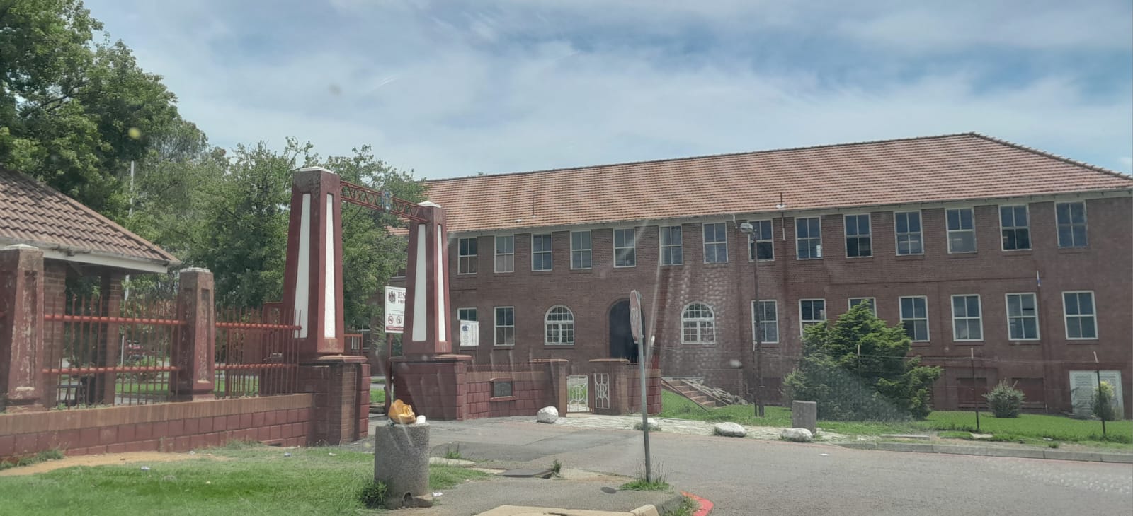 School withholds report cards from parents in arrears?