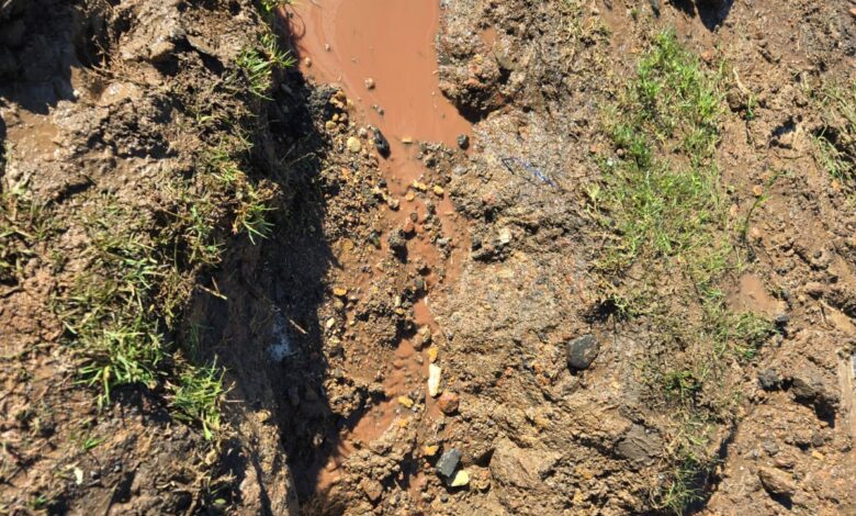 Image of a burst water pipe and the subsequent diversion.