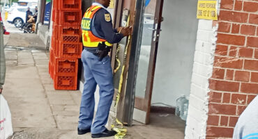 Image of police securing a crime scene.