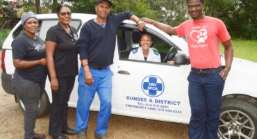 Image of Dundee SPCA staff next to their vehicle.