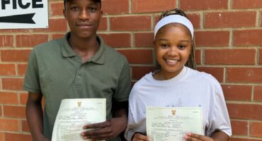 An image of Vryheid comprehensive Secondary School learners holding their matric statements after the results were released.