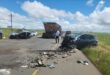 Image of crash scene on R34, two cars collided head-on with a truck passing by.