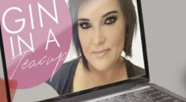 Image of the author's face on a laptop with the blog's name written in a pink bubble.