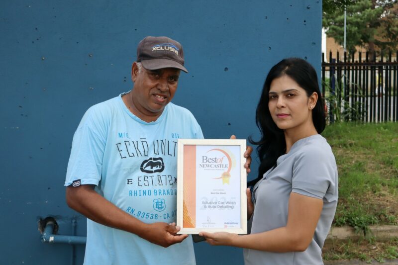 Newcastle Advertiser Readers Choice Award winner receiving their award.