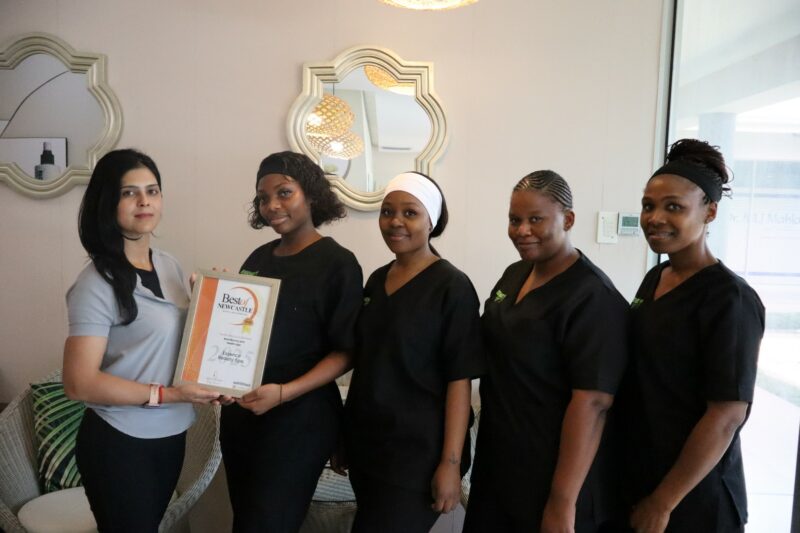 Newcastle Advertiser Readers Choice Award winner receiving their award.