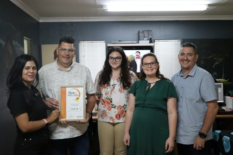 Newcastle Advertiser Readers Choice Award winner receiving their award.