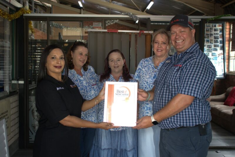 Newcastle Advertiser Readers Choice Award winner receiving their award.