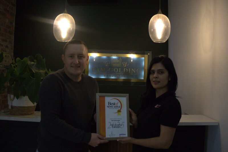Newcastle Advertiser Readers Choice Award winner receiving their award.