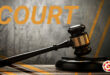 Stock image showing a gavel and the word COURT in capital