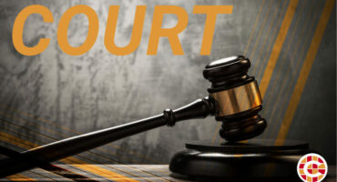 Stock image showing a gavel and the word COURT in capital