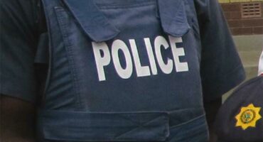 Image used by Kempton Express of a policeman in uniform showing only the branding on the vest.